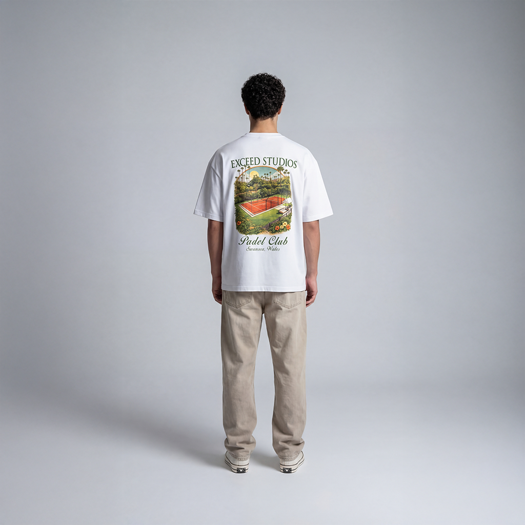  White padel Streetwear tee with large EXCEED Studios Padel Club Swansea Wales graphic featuring padel court illustration

