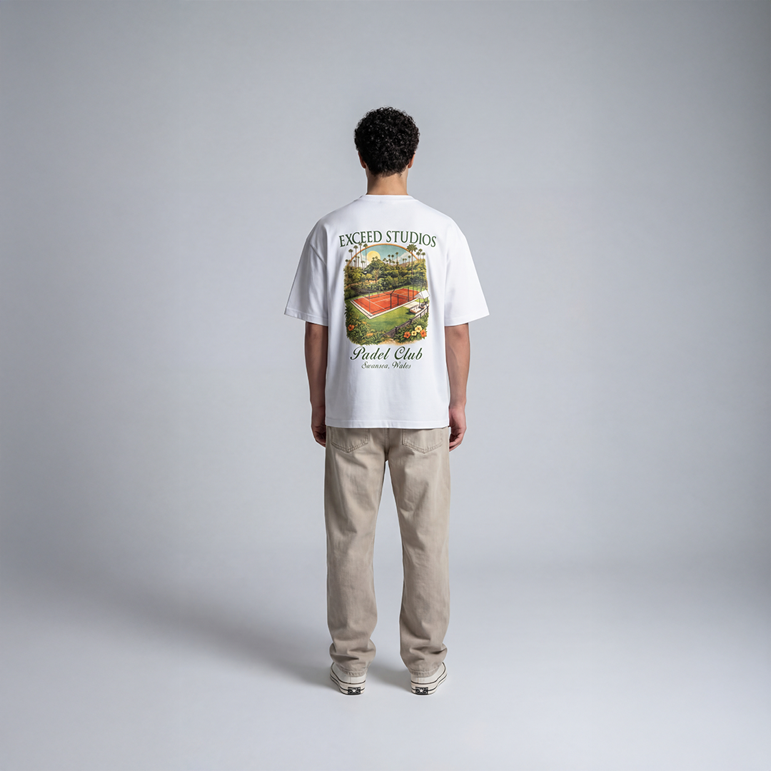  White padel Streetwear tee with large EXCEED Studios Padel Club Swansea Wales graphic featuring padel court illustration

