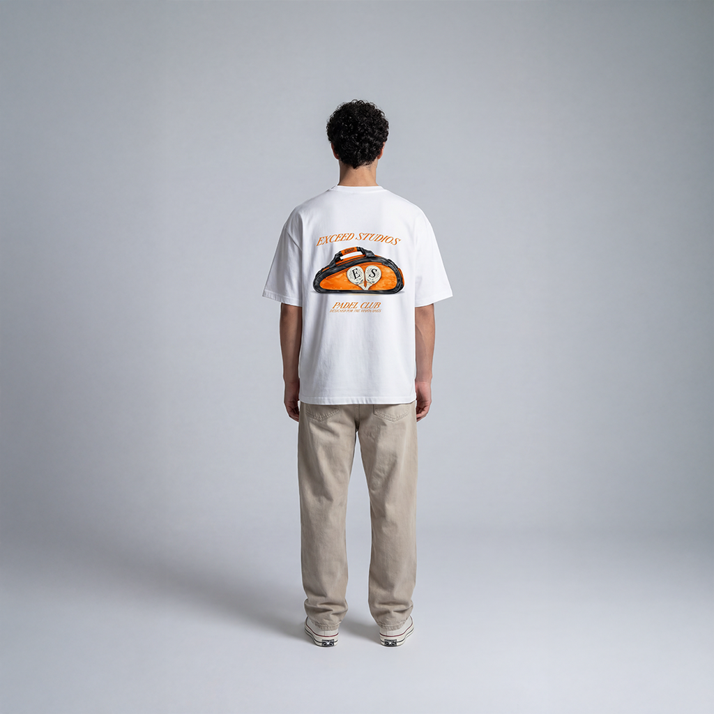 White padel streetwear tee with large EXCEED Studios padel bag graphic and Padel Club text on back